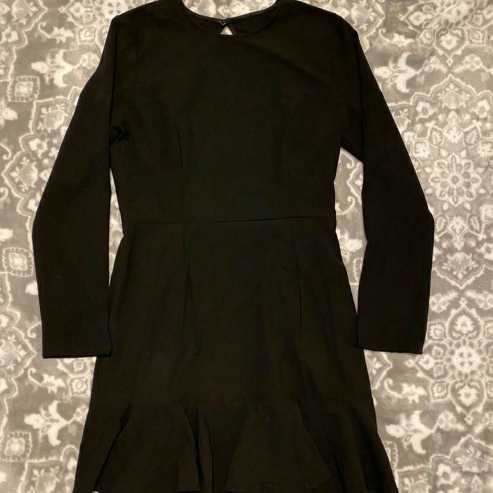 New Black dress with open back.